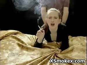 Voluptuous Sweetie Seductively Smoking