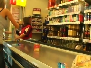 Slim blonde chick Nessa Devil strolls trhough a store while her lover is...