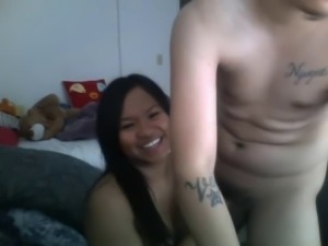 asian couple having fun together