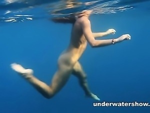 Nastya and Masha are swimming nude in the sea