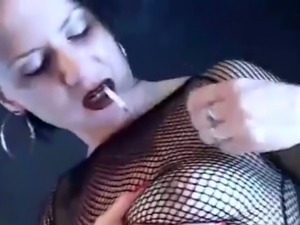 Mina in sexy kinky outfit smoking and teasing