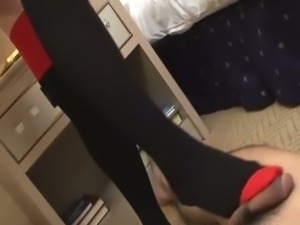 Miho Uehara rubs cock with feet and hand