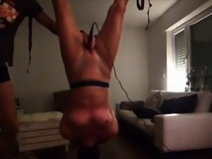 my slave Andrea dangling upside down