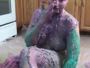 She pours colorful stuff on herself