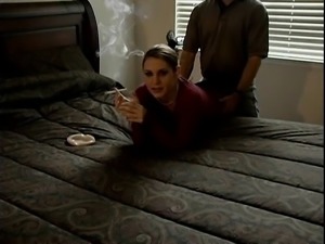 Bodacious brunette enjoys a cigarette while getting fucked
