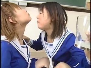Two Japanese schoolgirls blow multiple dudes and swap cum