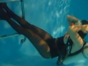 scuba mistress in high heels underwater