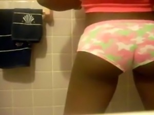 Amateur black cutie in nice panties was shaking her quite ordinary ass