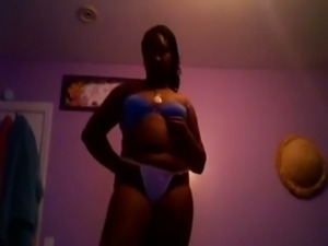 Amateur dark skinned lady flashed her big boobies and ass in thongs