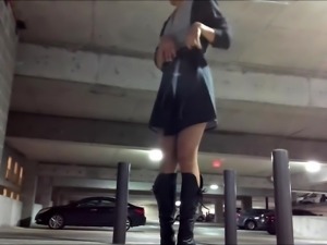 Alluring teen fucks herself with a dildo in a public place
