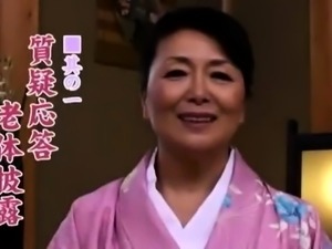 Luscious Japanese housewife has a young man banging her cunt