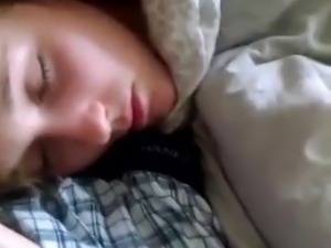 Boyfriend wakes his girlfriend with facial