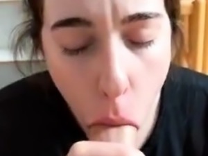 Amateur brunette slides a big cock down her throat in POV