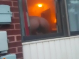 Window dildoing for people to watch