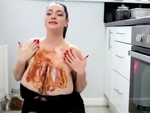 Big breasted brunette housewife gets covered in chocolate