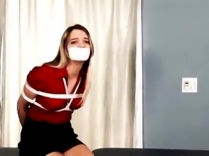 Sexy young babe with perky tits learns a lesson in bondage