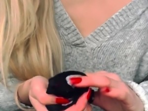 Pantyless blonde camgirl painting her luscious lips in red 