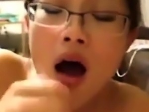 Cute asian sucks white guys dick and takes facial