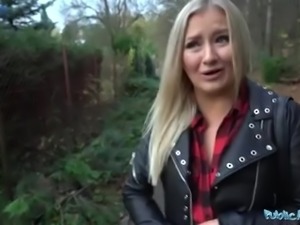 Chubby blonde shows her boobs in public and gets fucked through a hole on...