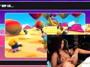 Webcam model with big tits plays video games fully naked