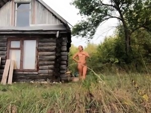 Naked girl in a Russian village