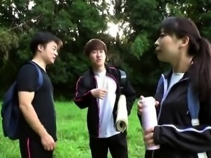 Japanese girl tricked into hardcore threesome outdoors