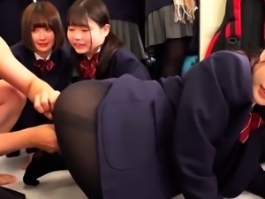 Pantyhosed Asian schoolgirls sharing cock in wild orgy
