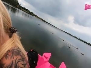 Amateur sex outdoors on a pedal boat with a girl