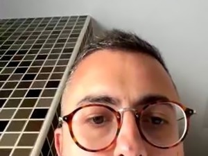 Guy with glasses cumming in the bathroom